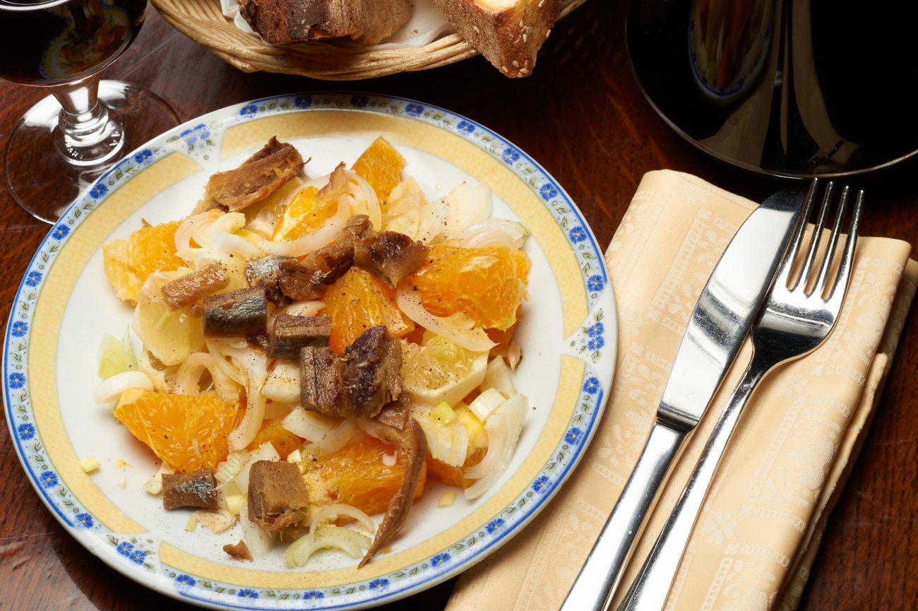 Herrings, oranges and olives salad